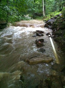 Under construction penstock floating after gully washer